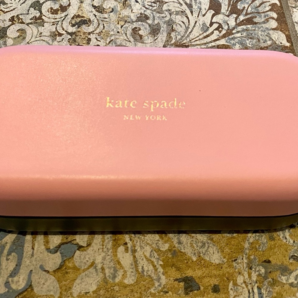 Brand new Kate Spade hard glasses case. Comes with wrapped cleaning cloth.